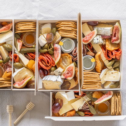 Cheese, figs, and crackers